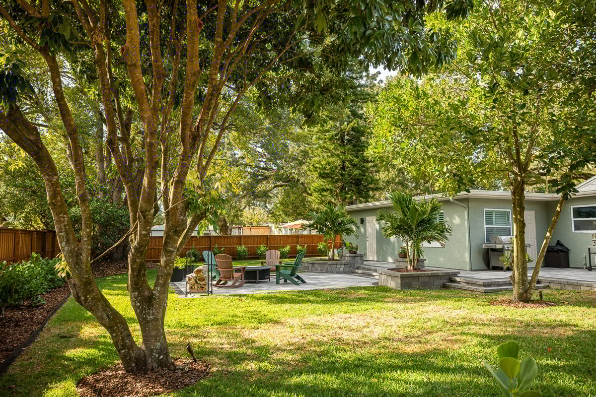 backyard fence turf planting beds hardscape