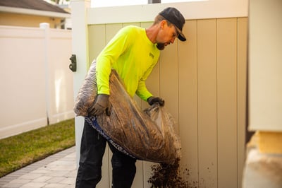 crew installing mulch perennials maintenance technician 10