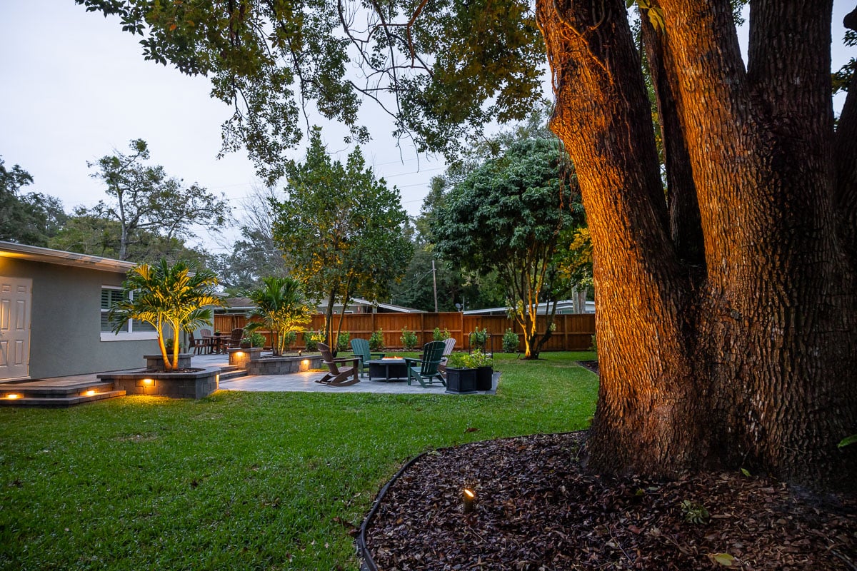 shade tree planting bed mulch turf patio hardscape