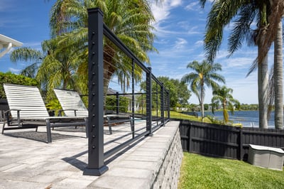 retaining wall fence outdoor furniture turf and raised patio 10