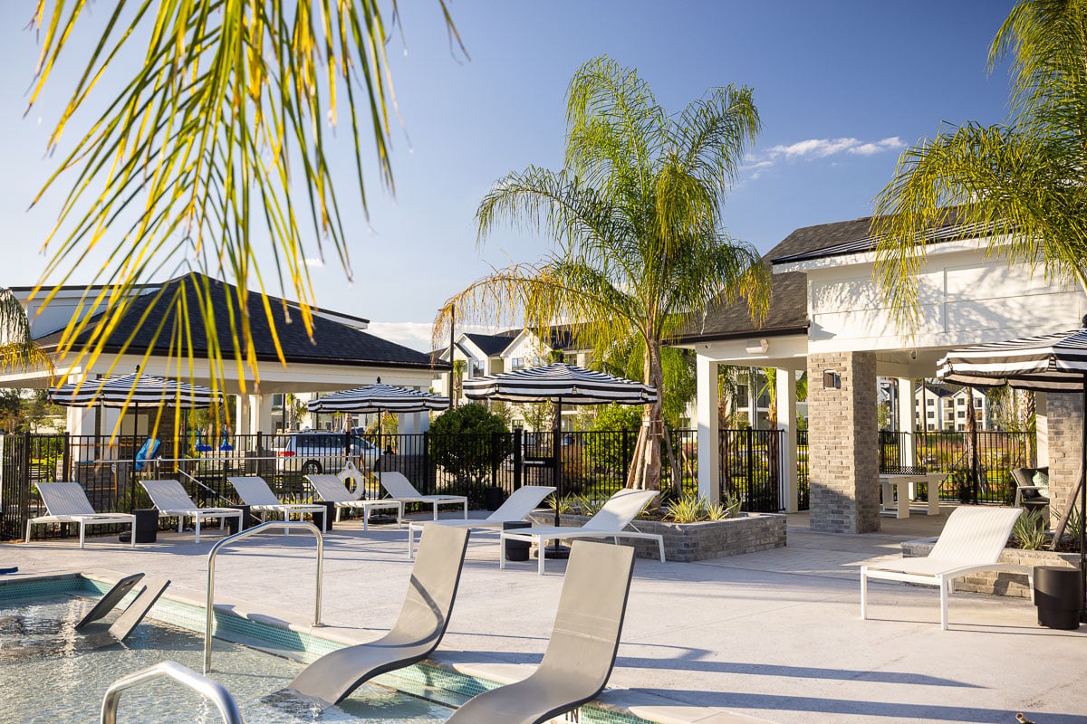 commercial apartments pool palm trees raised planters 17
