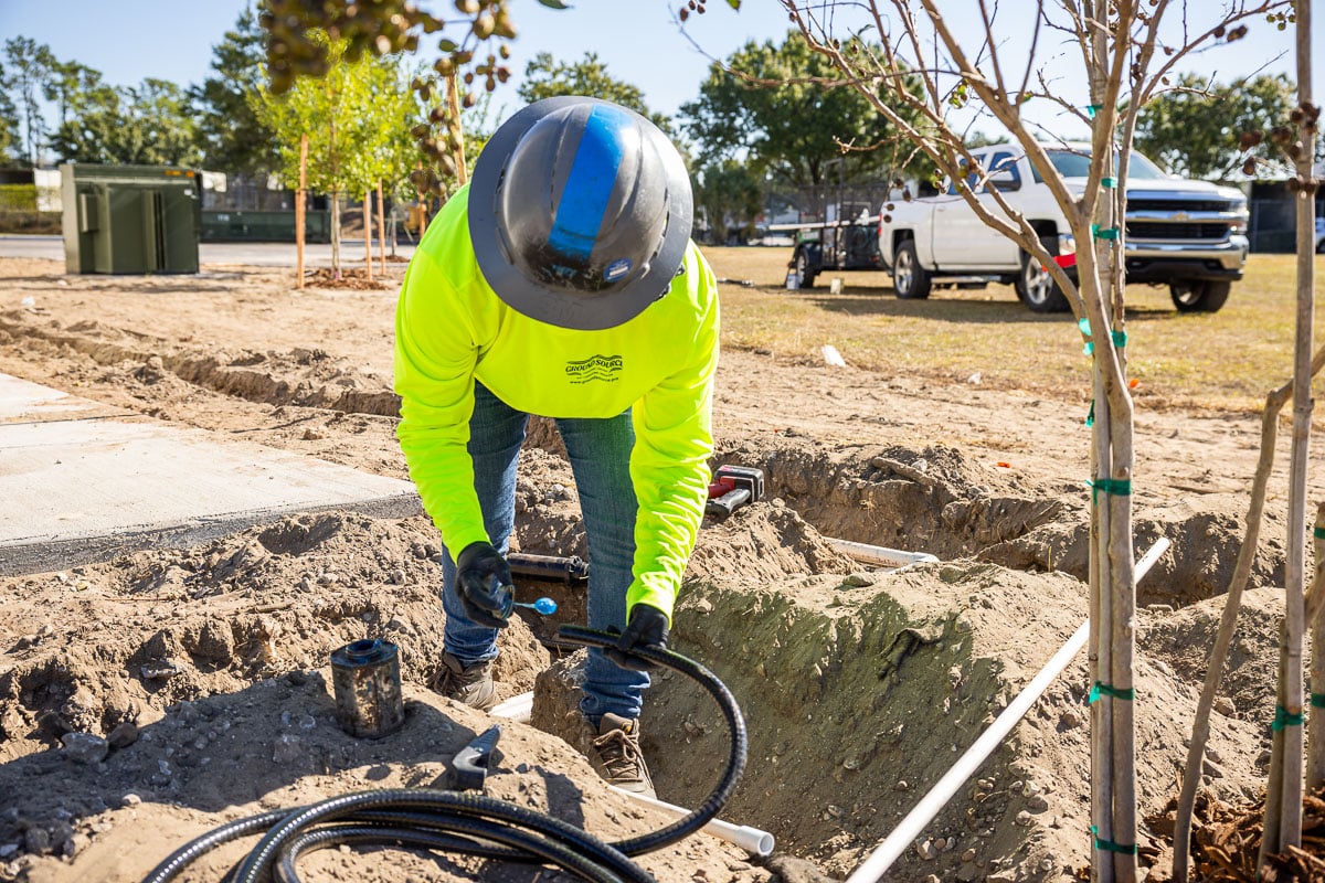 commercial construction irrigation installation warehouse industrial crew team 14