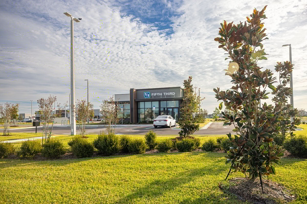 commercial retail bank planting beds shrubs sod lawn trees 10