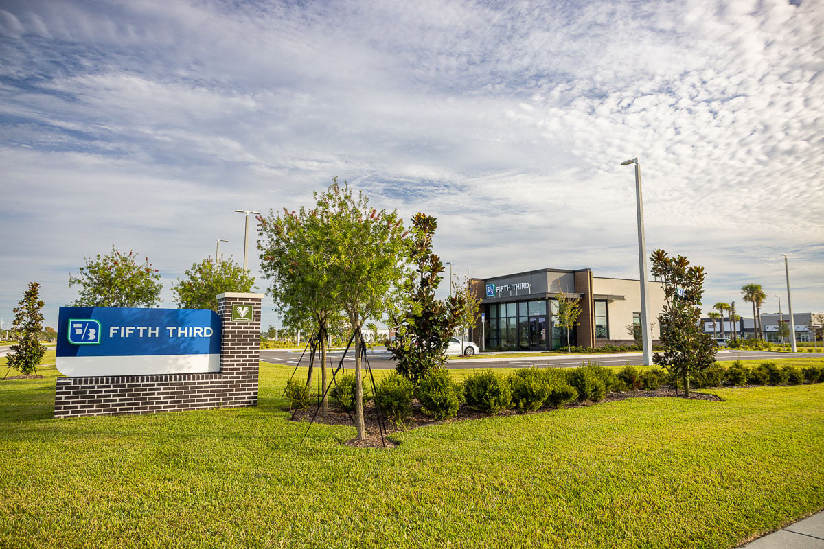 commercial retail bank planting beds shrubs sod lawn trees 6