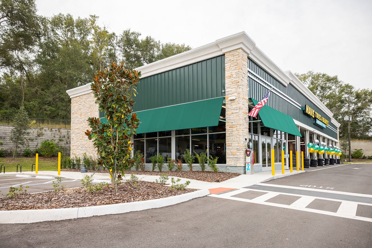 commercial retail parking lot entrance sign beds 13