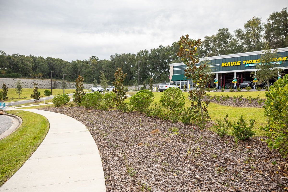 commercial retail parking lot entrance sign beds 5