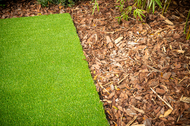 artificial turf and pine bark nugget mulch