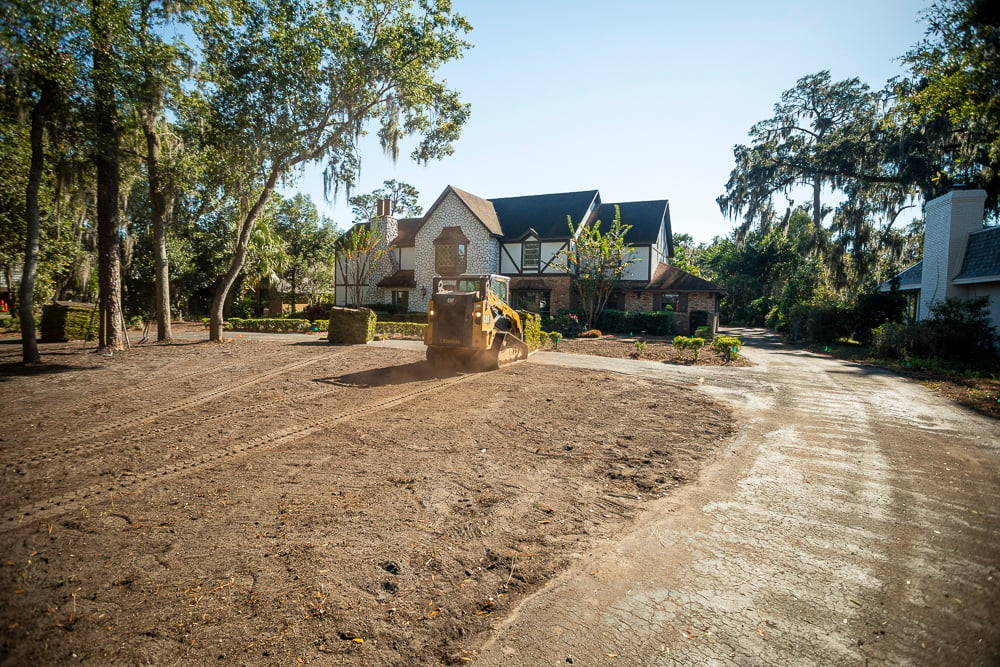 dirt in front yard of home