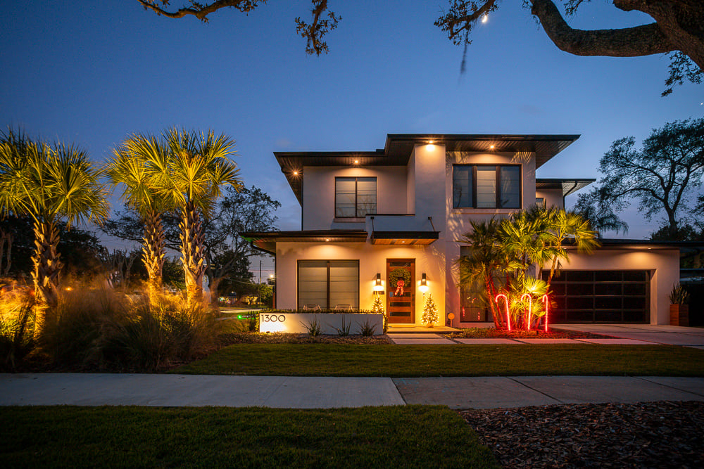 landscape lighting at front of home and on trees