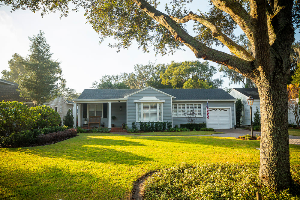 shade trees and planting beds in a central florida front yard
