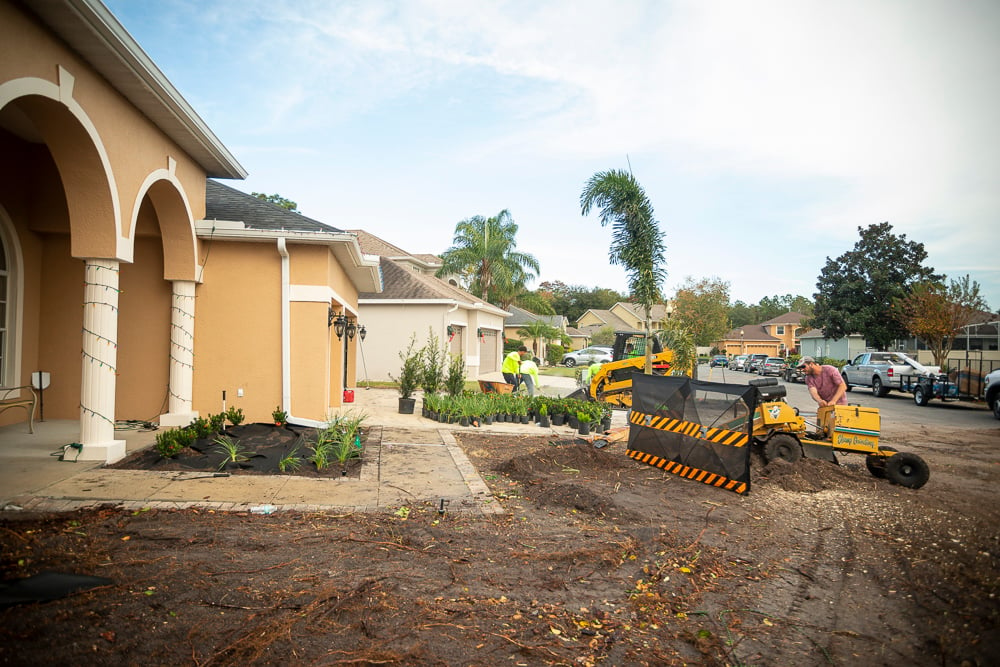 sod installation team moves soil