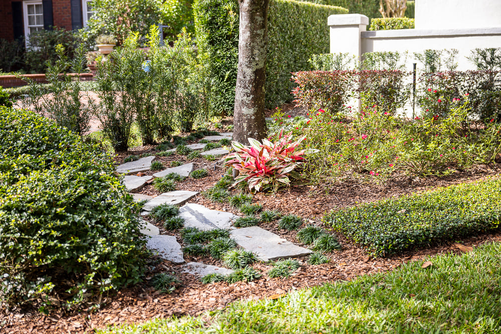 flagstone walkway through garden area