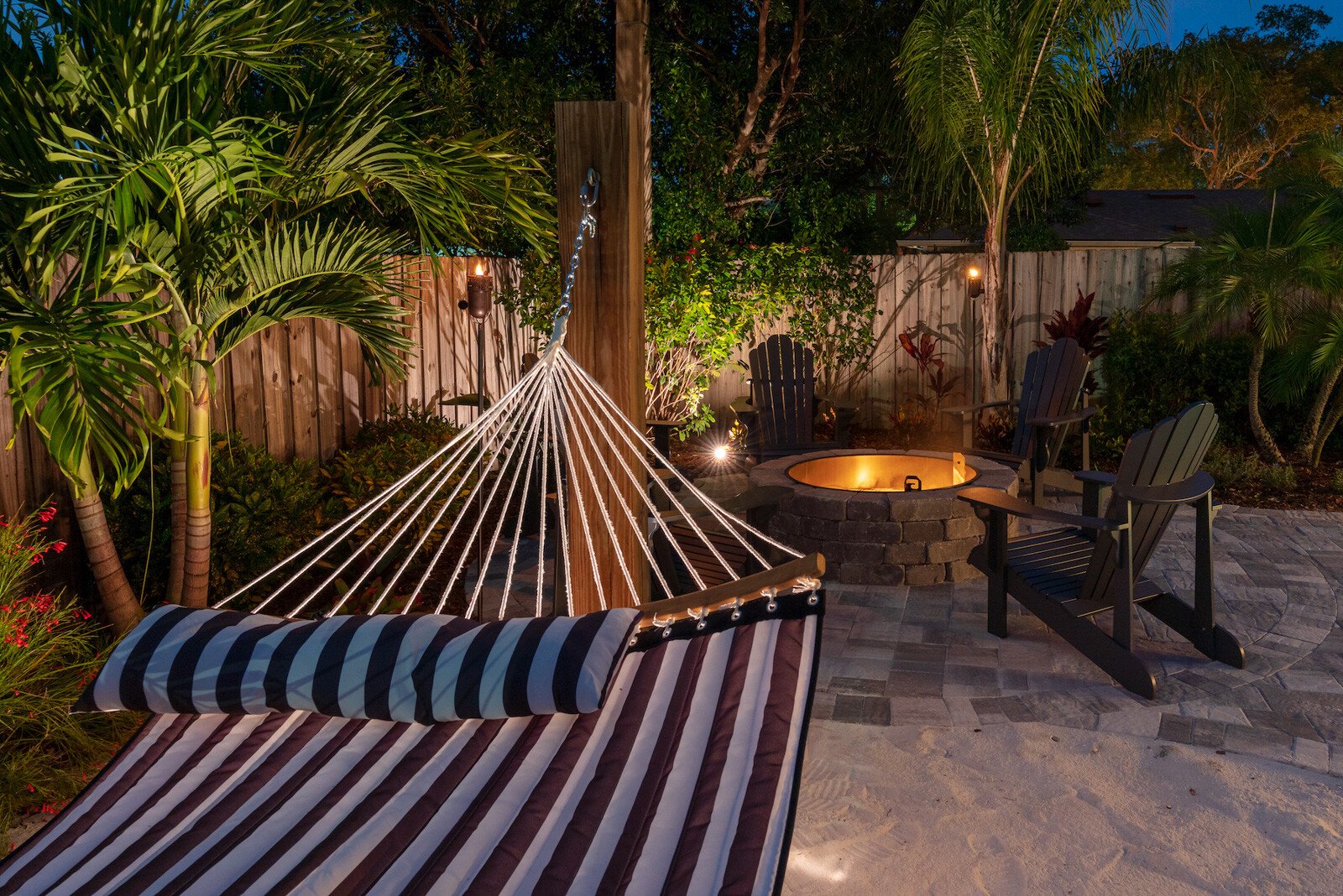 fire pit on patio with hammock