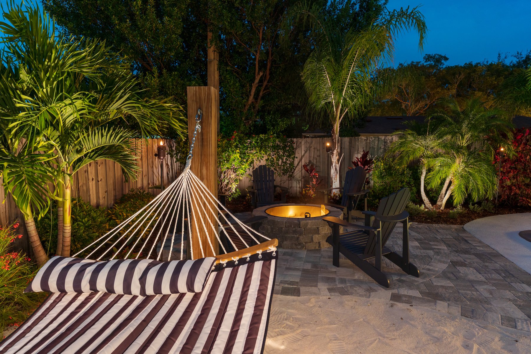 Pool side firepit and beach