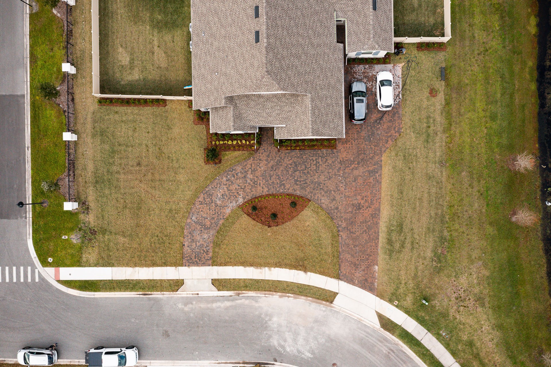 aerial photo of circular paver driveway