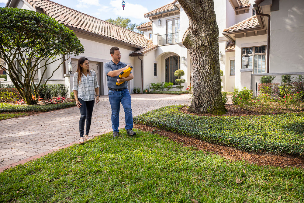 landscape designer and customer consultation walking 1