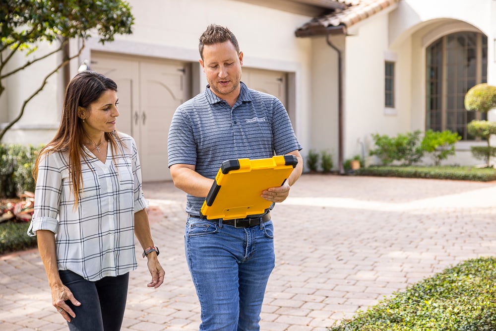 landscape designer and customer consultation walking 