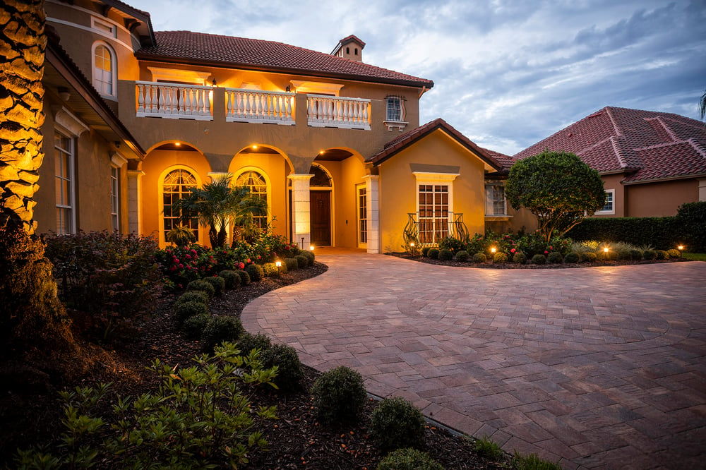 Paver driveway with landscape lighting