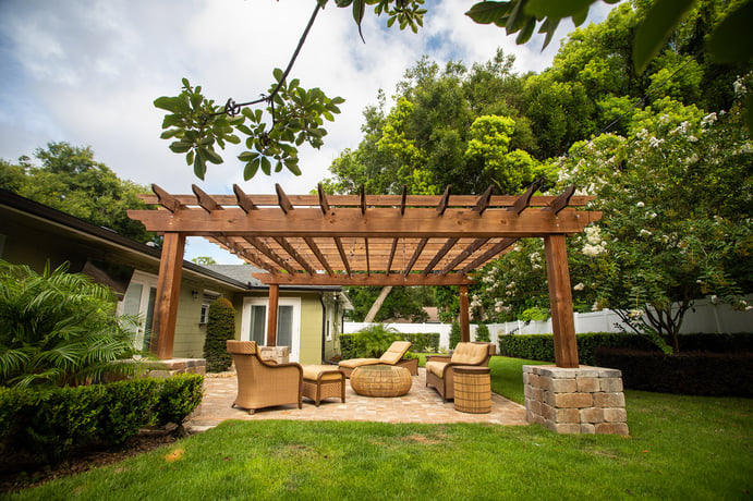 pergola in backyard over patio