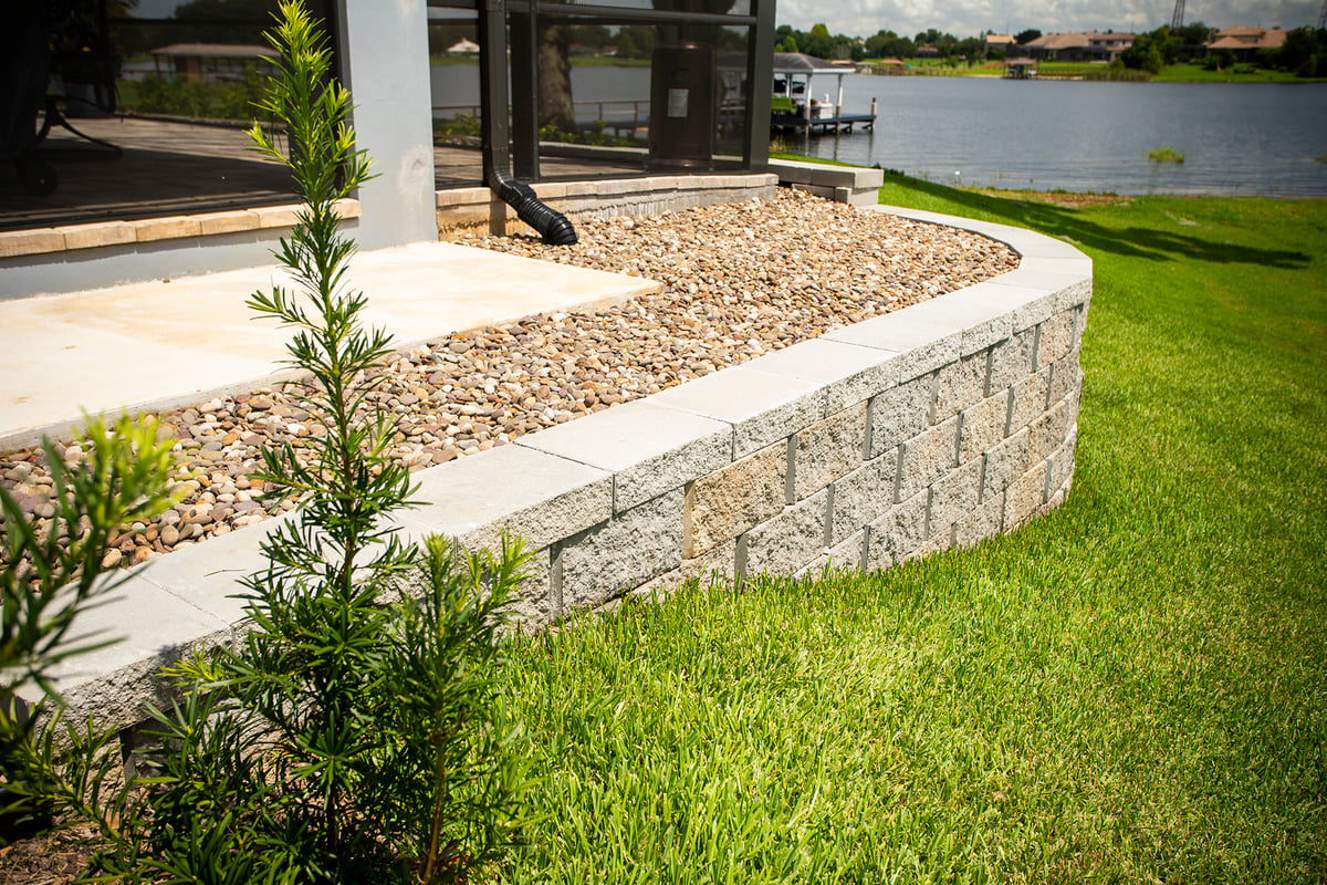 small retaining wall with plantings