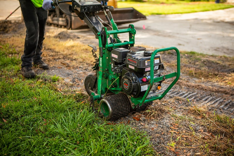 sod cutter being used to remove sod before new sod installation