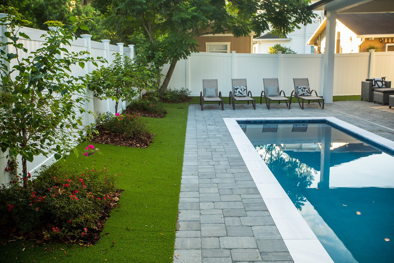 Pool surrounded by landscaping plants 