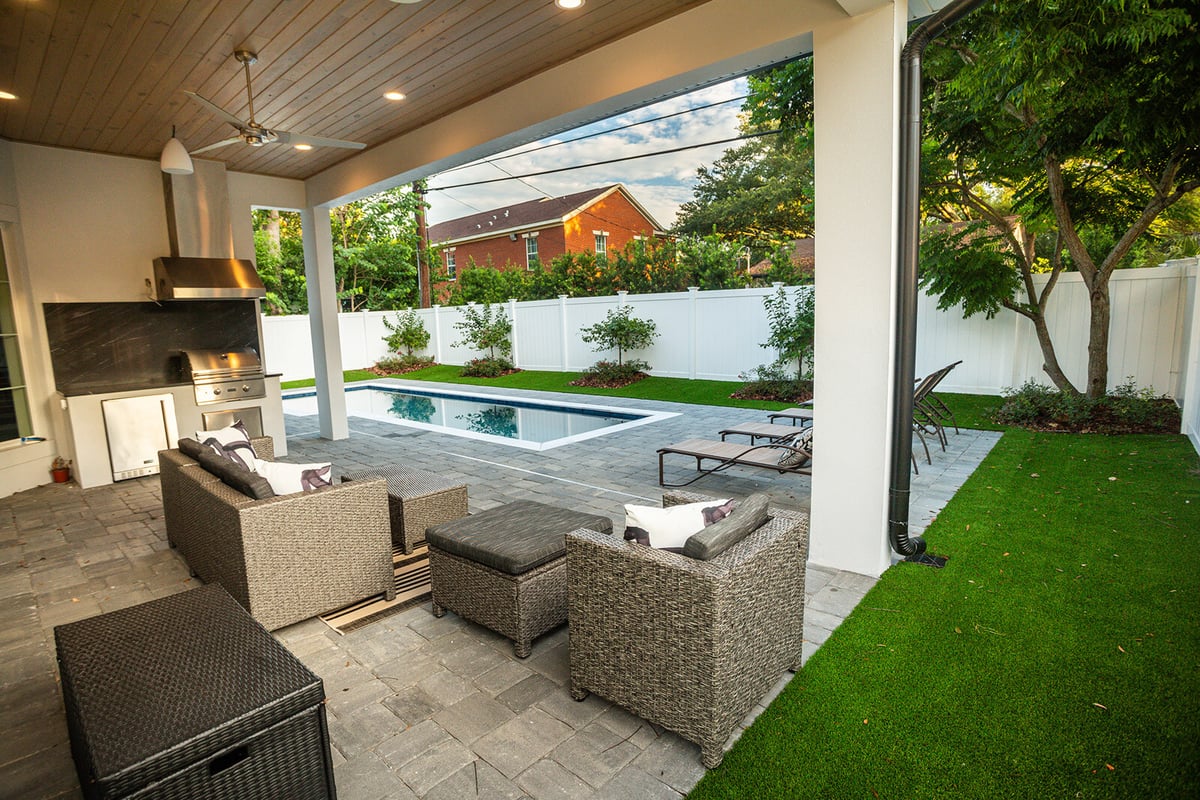 artificial grass around pool and patio