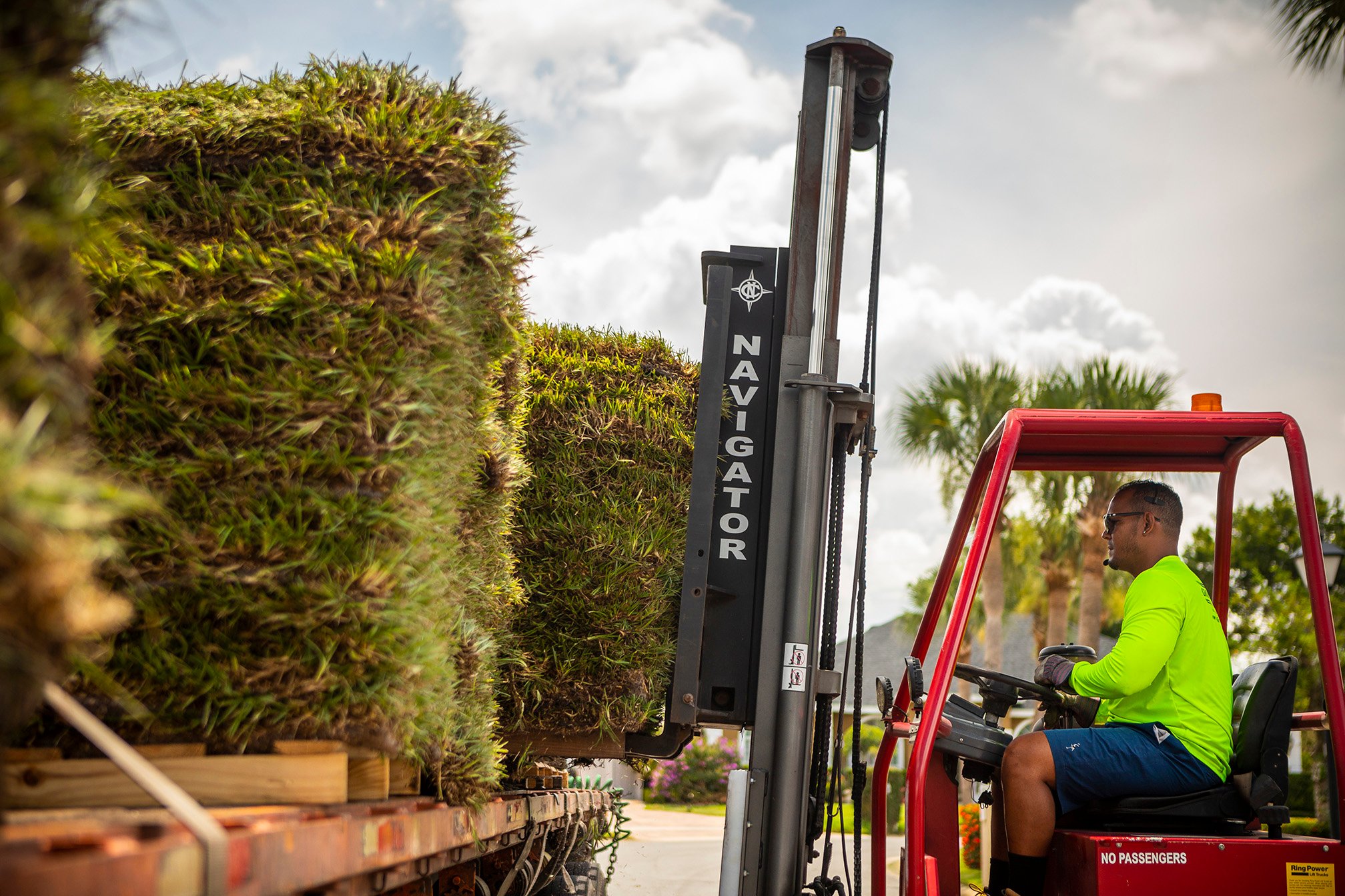 Landscape team unloading fresh sod