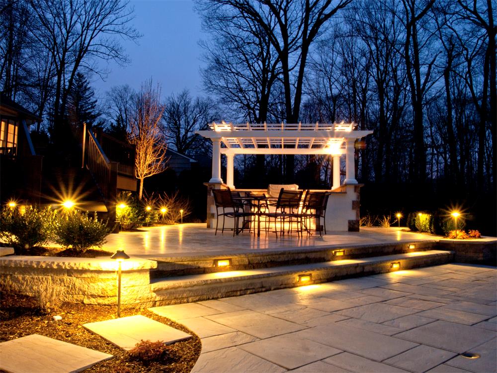 Landscape lighting design on patio and pergola