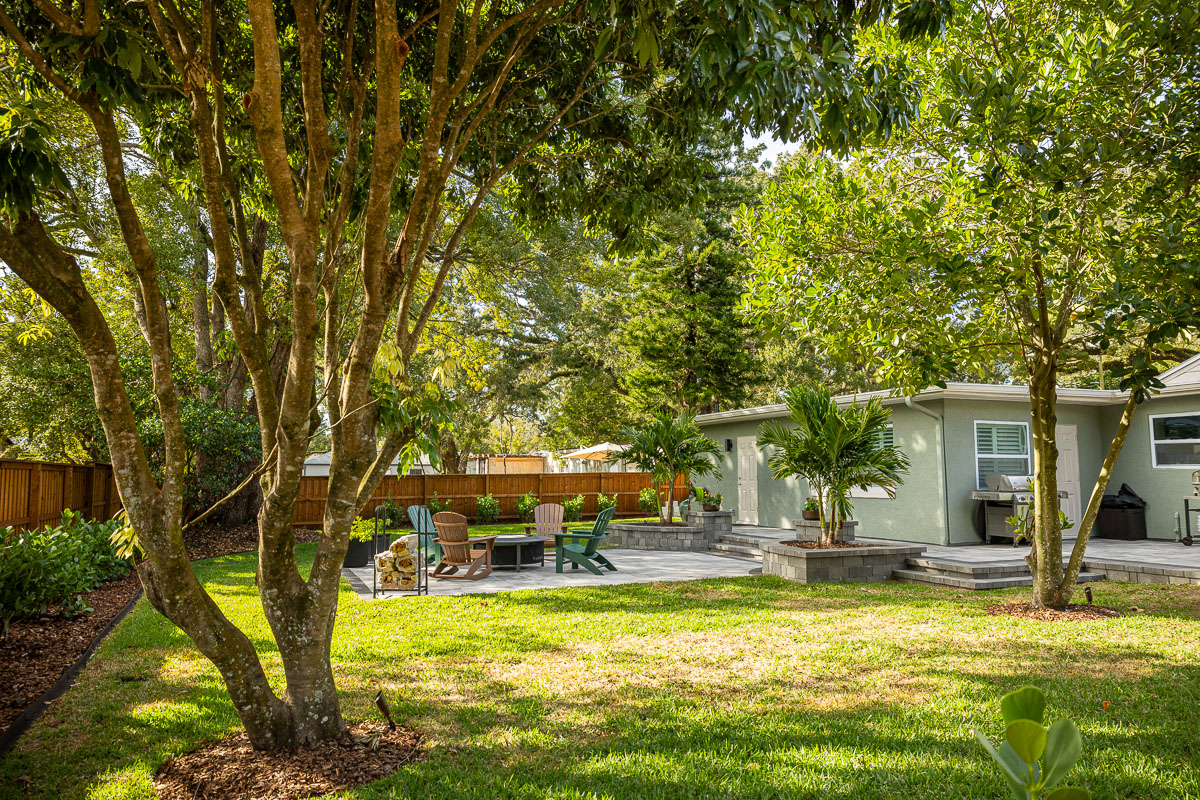 orlando backyard with shade trees and shrubs