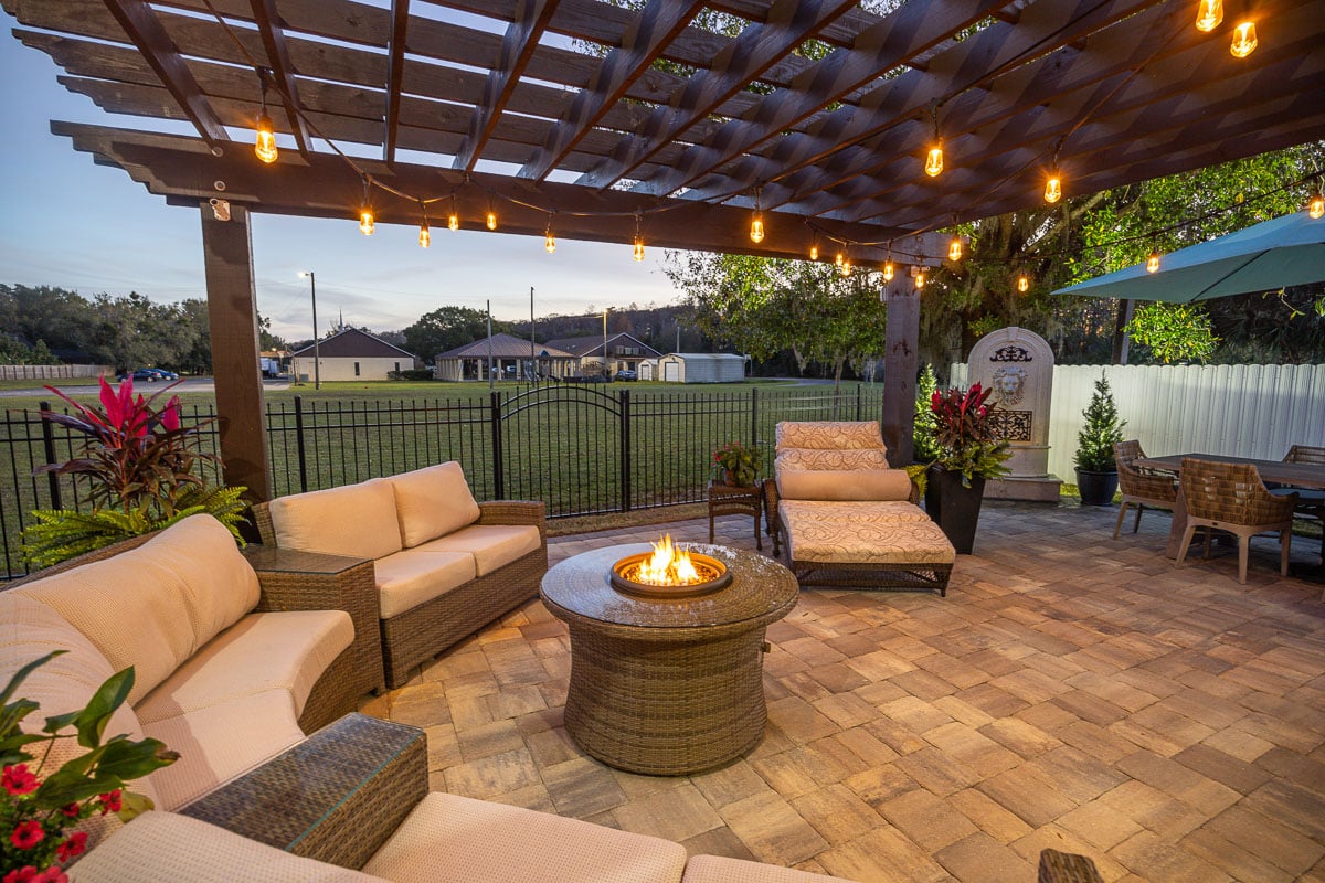 backyard patio with firepit and pergola