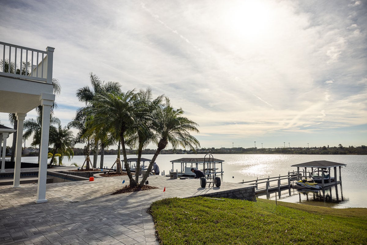 nice lawn and palm trees at a waterfront orlando property