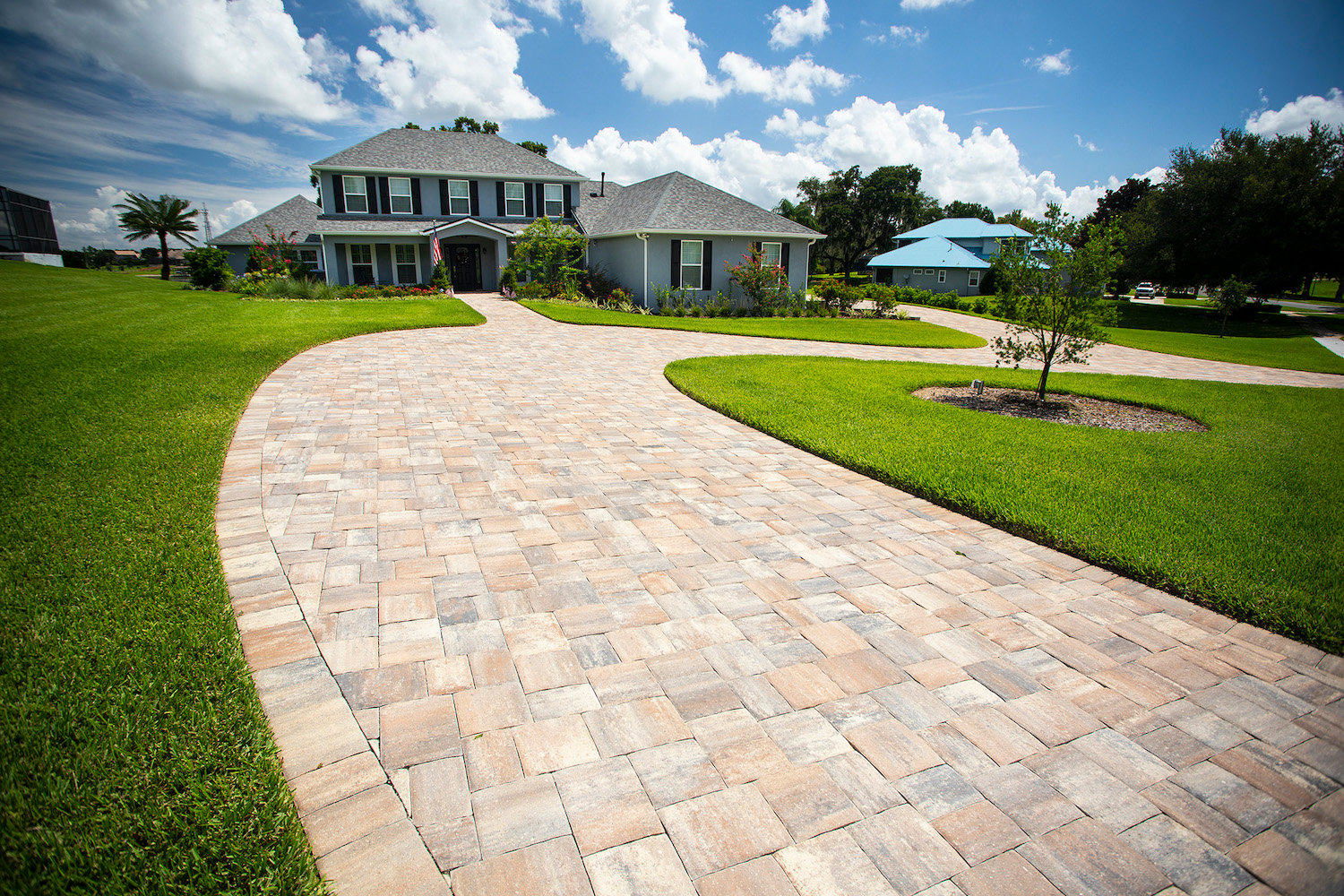 long driveway and walkway built with pavers