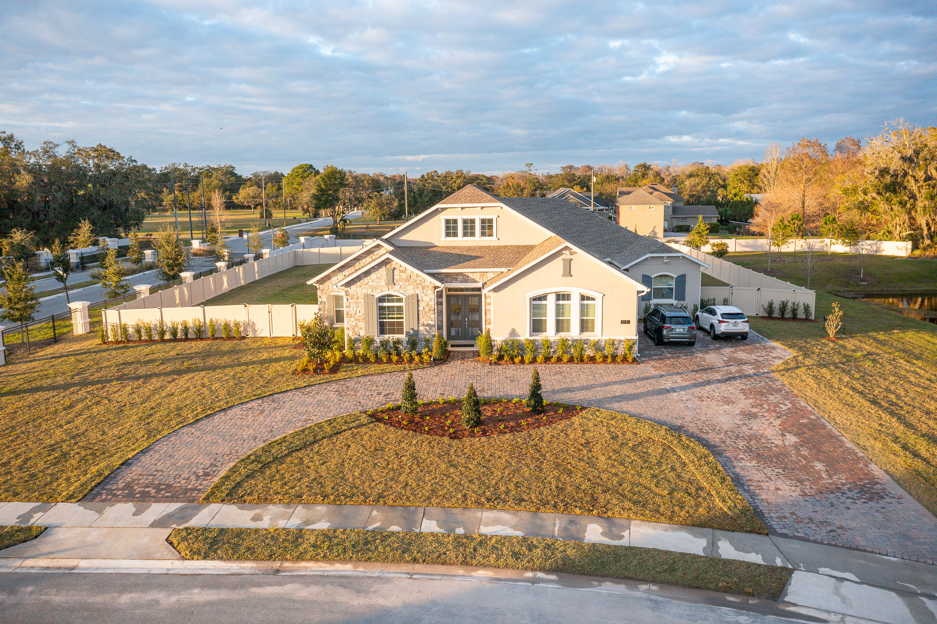 aerial photo of paver driveway and plantings