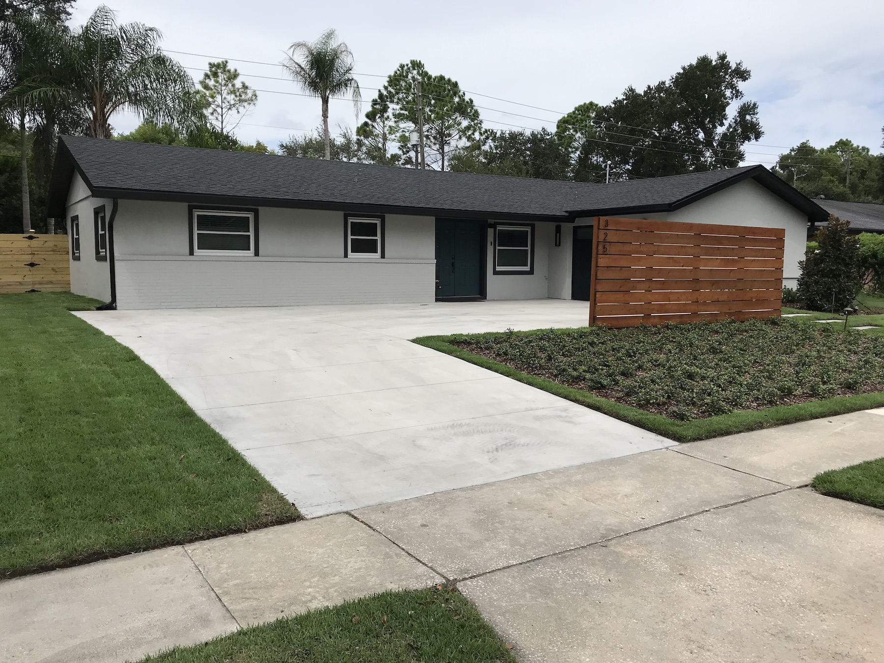 home with ground cover plantings